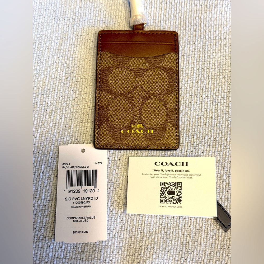 Signature canvas Coach Id Card Holder. Khaki/saddle brown. NWT. Brand new.